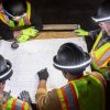 high visibility clothing and halo hat worn by construction workers at night